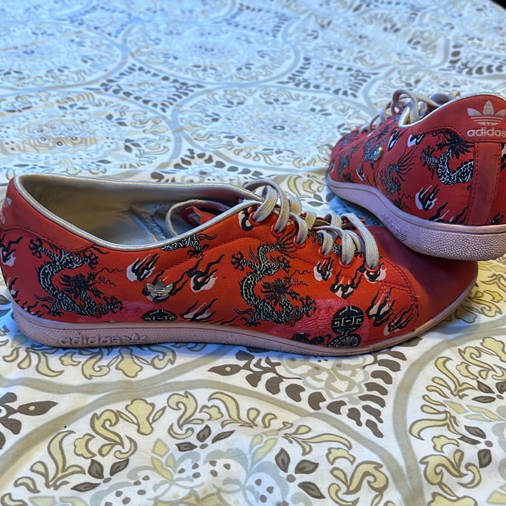 Dragon, red, suede & fabric Adidas. 
Label reads size9.5, but they fit like a 9.